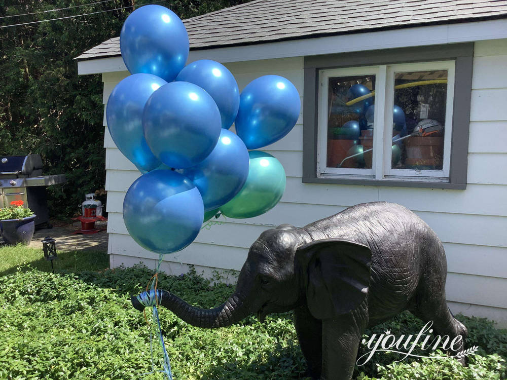 Canadian client feedback showing the seasonally decorated bronze baby elephant statue