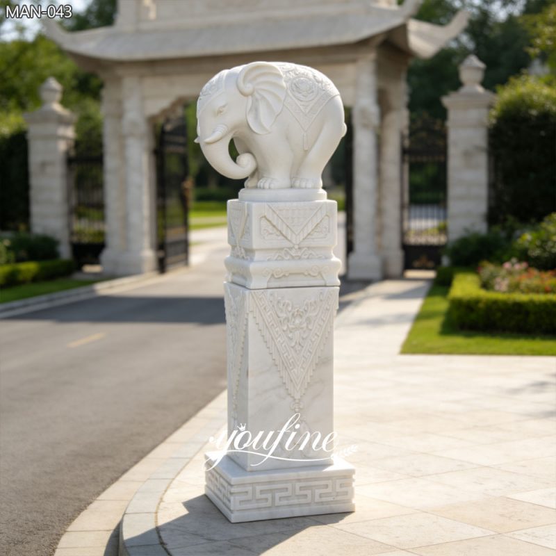 Estatua de elefante tallada a mano con columna.