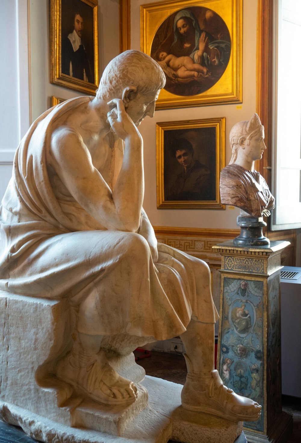 Italy Rome Galleria Spada Gallery Palazzo statue of Greek philosopher, Aristotle in a sitting thinking pose