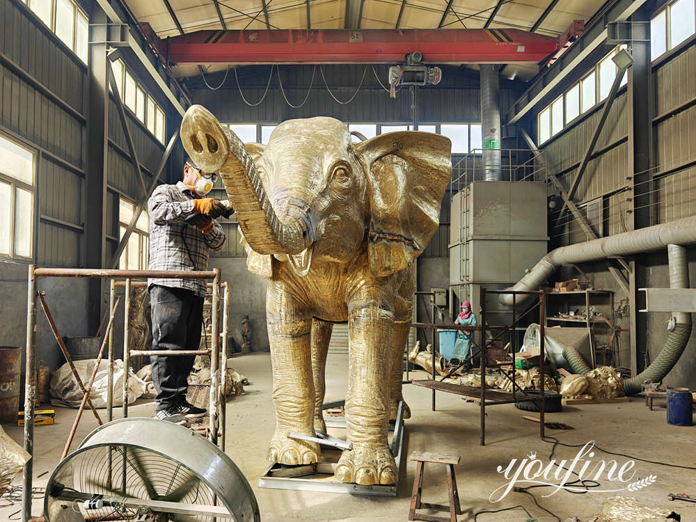 YouFine artisan casting and assembling a large bronze elephant statue