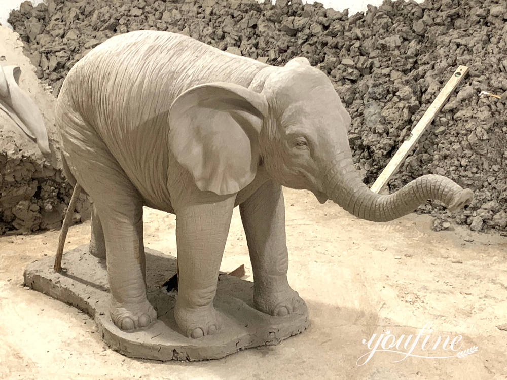 Clay model of the custom bronze baby elephant statue