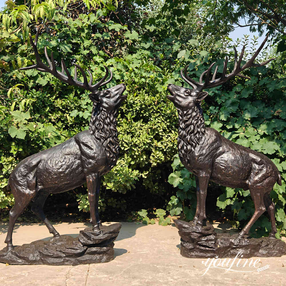 Bronce stag par dispuesto sobre una base de estilo rocoso